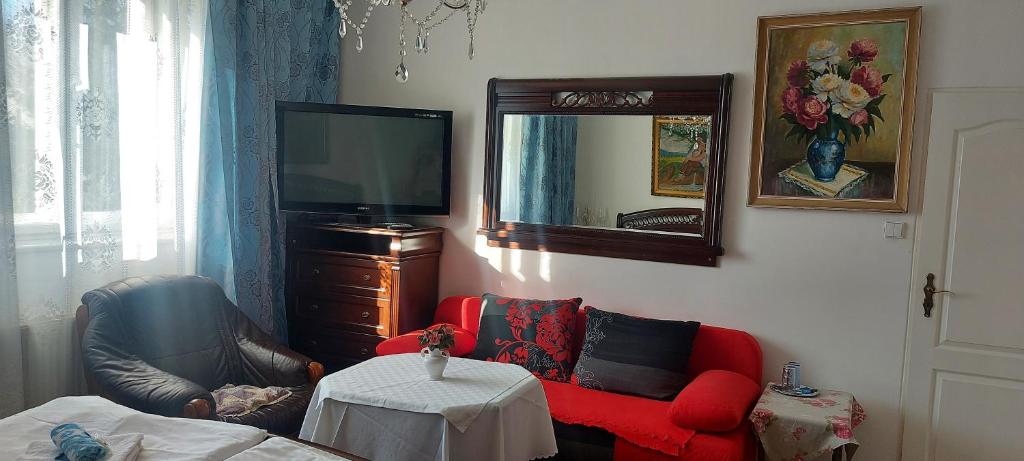 TV a/nebo společenská místnost v ubytování Hotel Garni