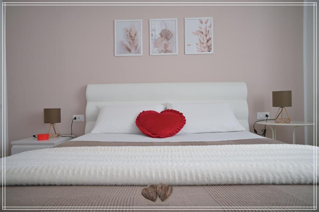 Ένα ή περισσότερα κρεβάτια σε δωμάτιο στο Medico Romantic House
