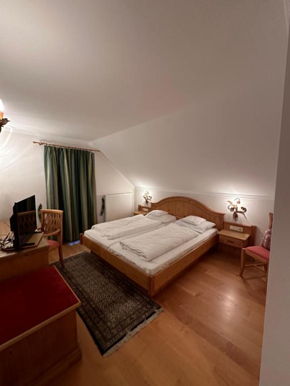 Postel nebo postele na pokoji v ubytování Esterer