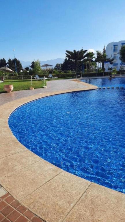 Bazén v ubytování Appartement Complexe Riviera Beach Cabo Airport Piscine Plage WiFi Parking Security nebo v jeho okolí