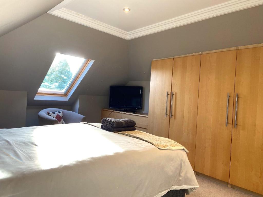 Postel nebo postele na pokoji v ubytování 26 Green Drive Inverness