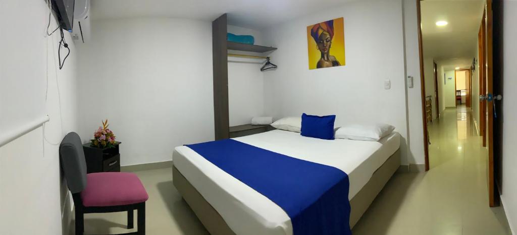 Postel nebo postele na pokoji v ubytování Hotel ITACO