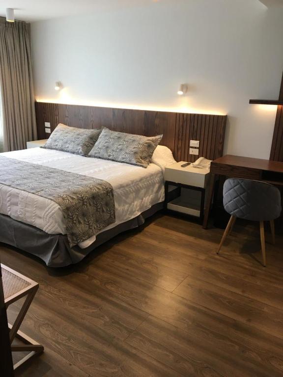 Postel nebo postele na pokoji v ubytování Hotel Ajavi