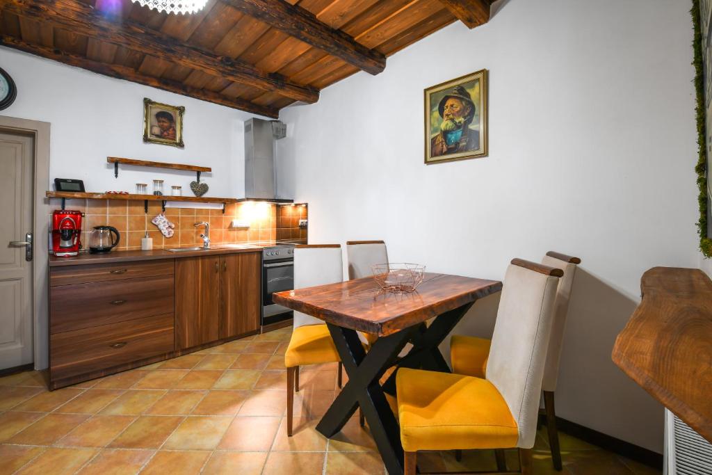 Kuchyňa alebo kuchynka v ubytovaní Apartmány Berries