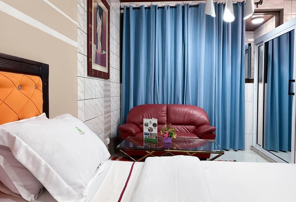 Postel nebo postele na pokoji v ubytování Double twins Hotel & Suites