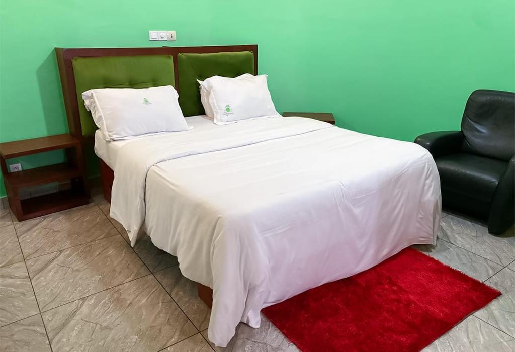 Postel nebo postele na pokoji v ubytování Double twins Hotel & Suites