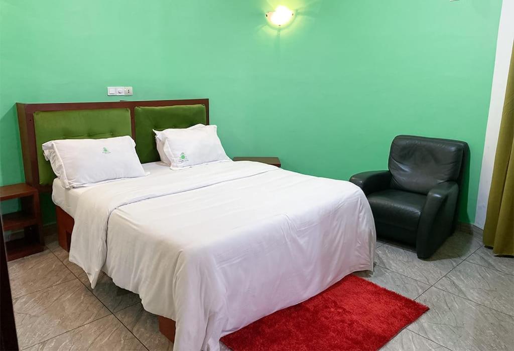 Postel nebo postele na pokoji v ubytování Double twins Hotel & Suites