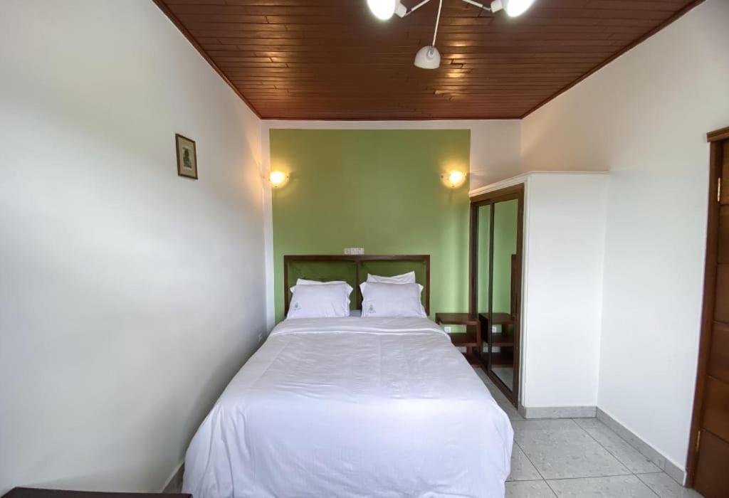Postel nebo postele na pokoji v ubytování Double twins Hotel & Suites