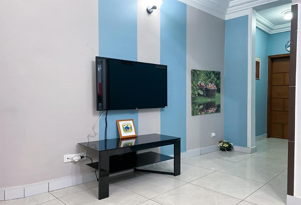TV a/nebo společenská místnost v ubytování Double twins Hotel & Suites
