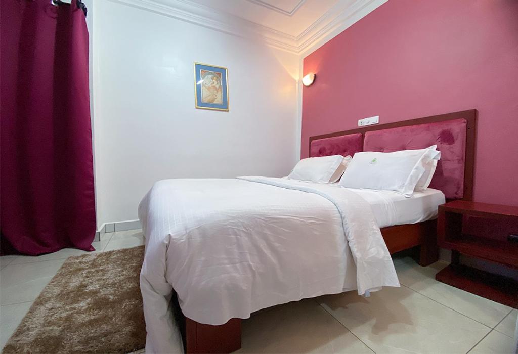 Postel nebo postele na pokoji v ubytování Double twins Hotel & Suites