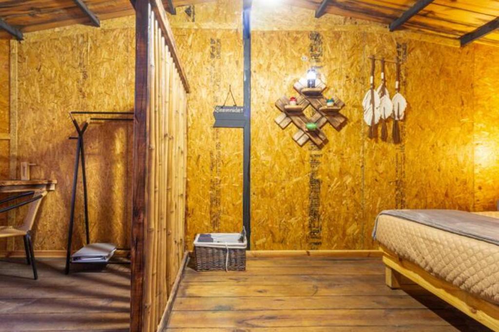 Postel nebo postele na pokoji v ubytování Cabañas Miranda