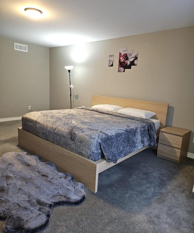 Postel nebo postele na pokoji v ubytování Oasis Lounge