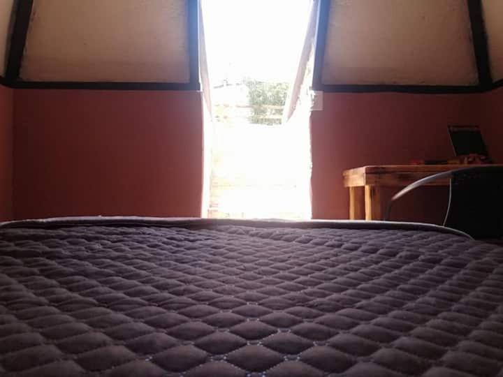 Postel nebo postele na pokoji v ubytování Cabañas Miranda
