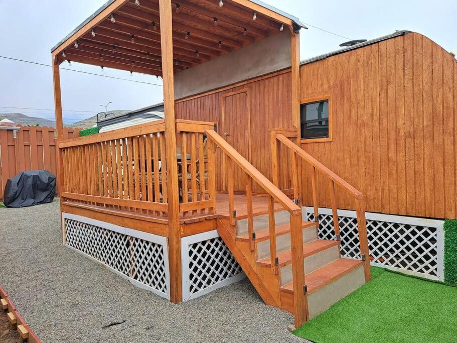 a deck with a staircase on a house at Sunset Trailer Park RV #1 in El Suazal