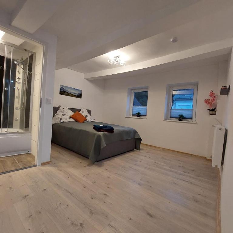 Postel nebo postele na pokoji v ubytování Hotel Bei Maria