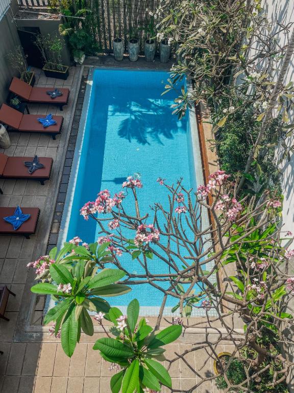 Bazén v ubytování Dusit Hotel Siem Reap nebo v jeho okolí