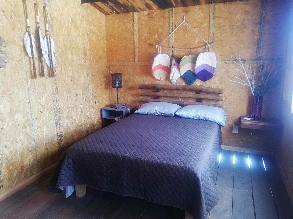 Postel nebo postele na pokoji v ubytování Cabañas Miranda