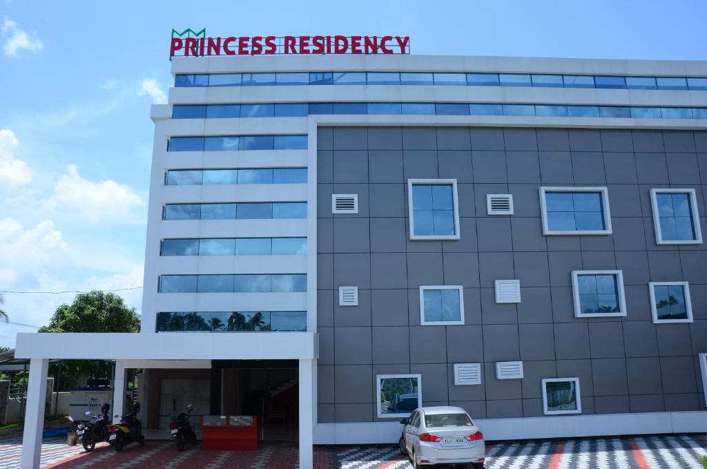 a building with a sign that reads princess residence residency at Princess Residency in Nedumbassery