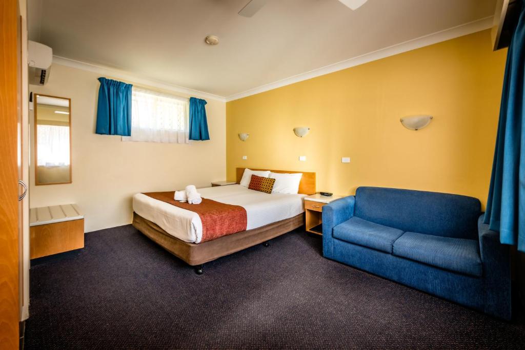 Postel nebo postele na pokoji v ubytování Park Beach Resort Motel
