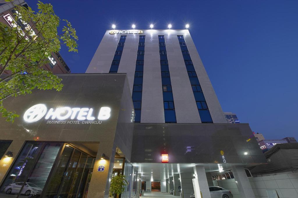 a building with a sign on the top of it at Hotel B in Gwangju