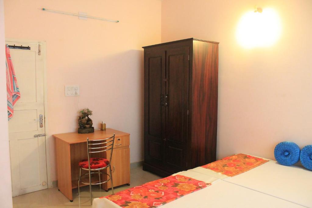 Postel nebo postele na pokoji v ubytování Oshin Home Stay