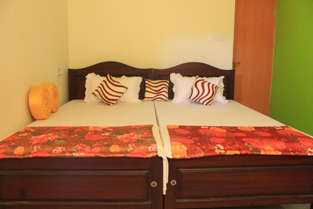 Postel nebo postele na pokoji v ubytování Oshin Home Stay