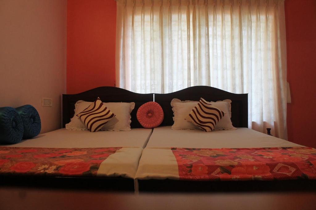 Postel nebo postele na pokoji v ubytování Oshin Home Stay