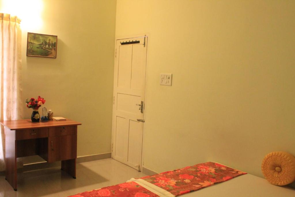 Postel nebo postele na pokoji v ubytování Oshin Home Stay