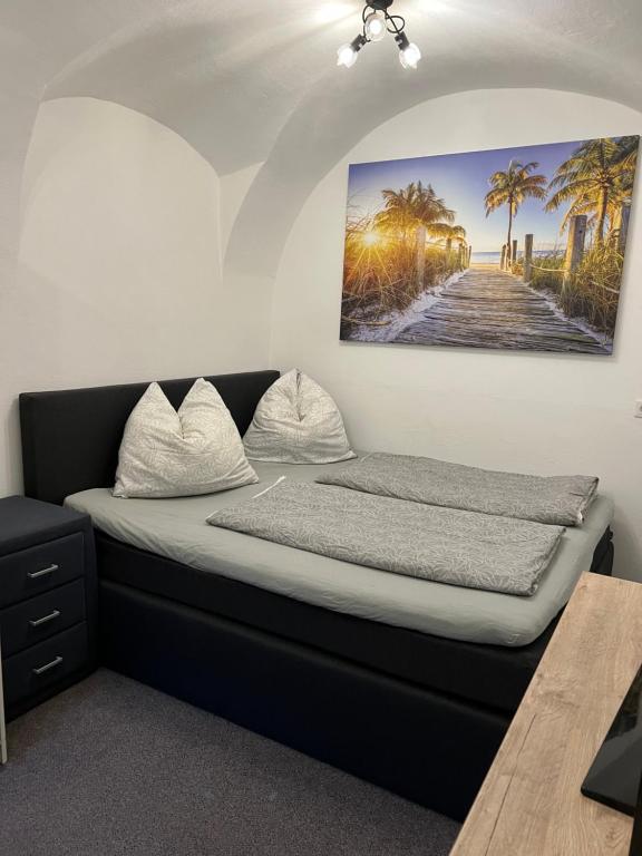 Postel nebo postele na pokoji v ubytování Ferienwohnung Eden