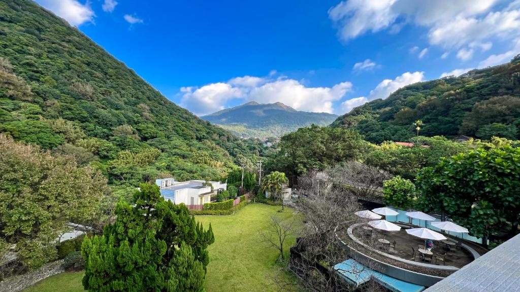 an aerial view of a valley with a mountain at CHECK inn Select Taipei Yamgmingshan in Taipei
