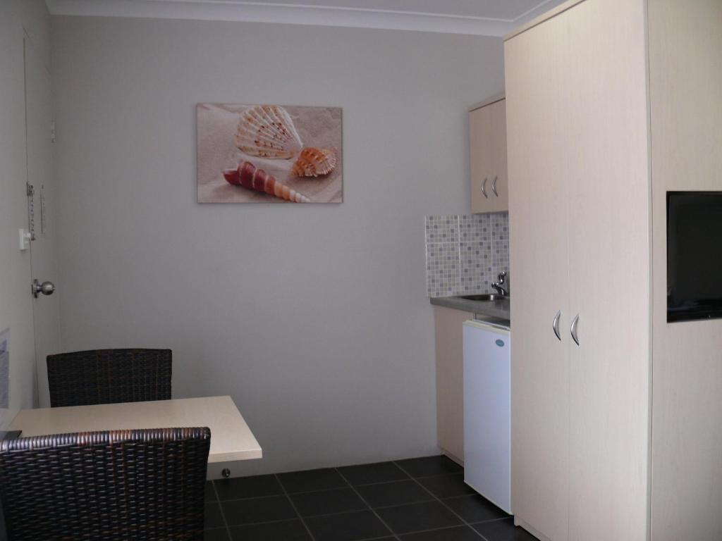 Kuchyň nebo kuchyňský kout v ubytování Park Beach Resort Motel