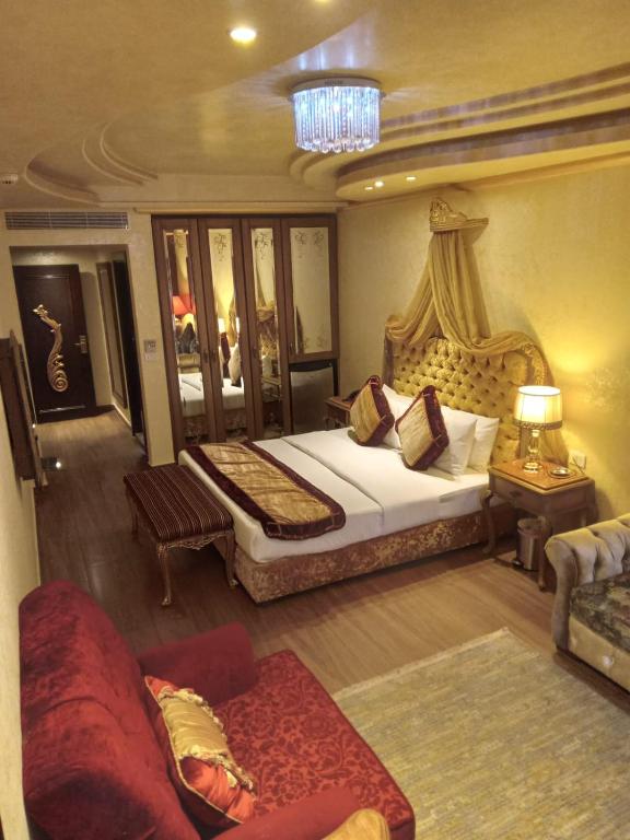 Postel nebo postele na pokoji v ubytování Q Hotel