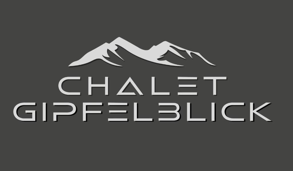 een logo voor een skigebied met een berg bij Chalet Gipfelblick in Hopfgarten im Brixental