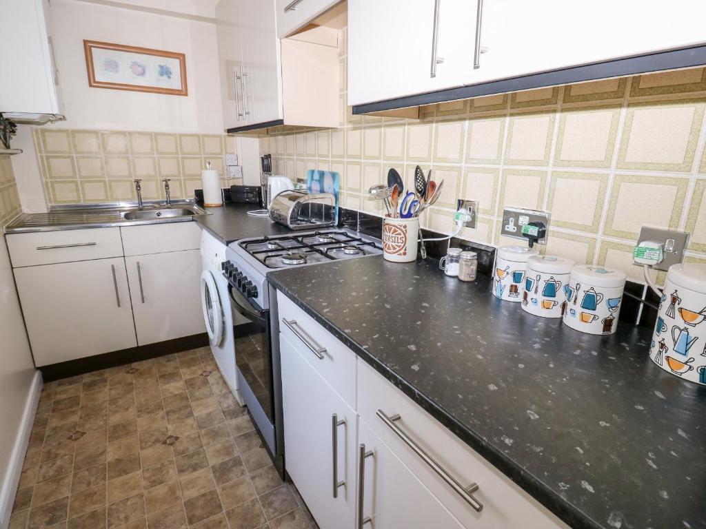 Kuchyň nebo kuchyňský kout v ubytování Marsh Cottage