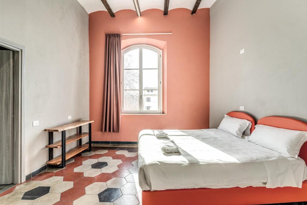 Postel nebo postele na pokoji v ubytování Borgo Ripa Urban Travel
