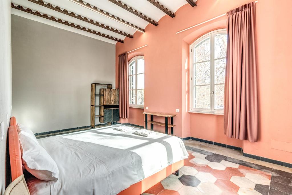 Postel nebo postele na pokoji v ubytování Borgo Ripa Urban Travel