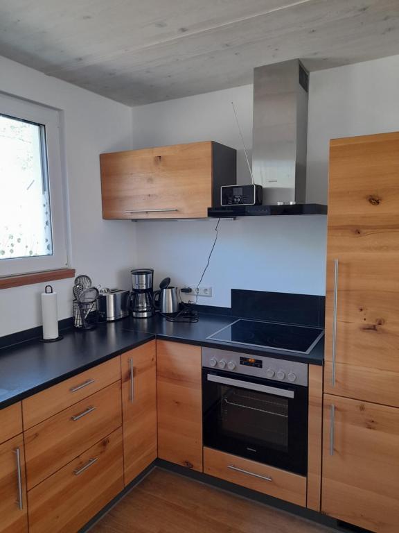 Kuchyň nebo kuchyňský kout v ubytování Ferienhaus Bug