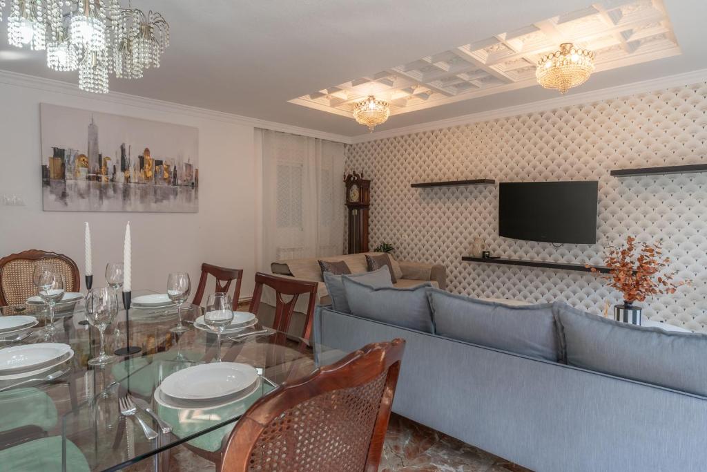 A television and/or entertainment centre at tuGuest Gran Via 42