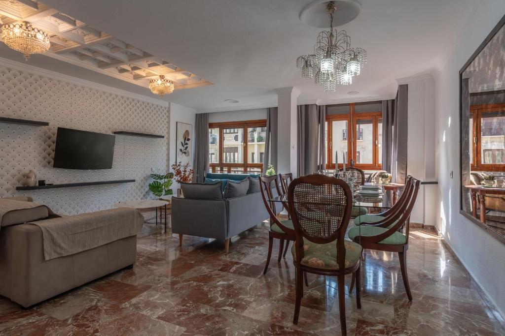 A television and/or entertainment centre at tuGuest Gran Via 42