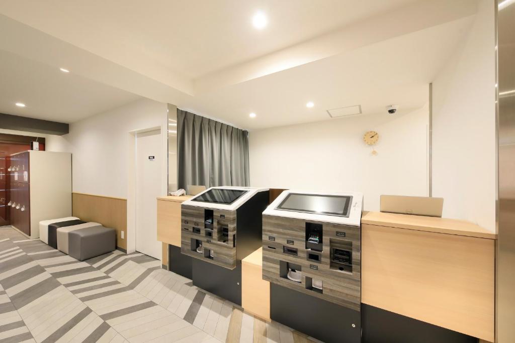 Kuchyň nebo kuchyňský kout v ubytování Hotel NewNagano NeXT