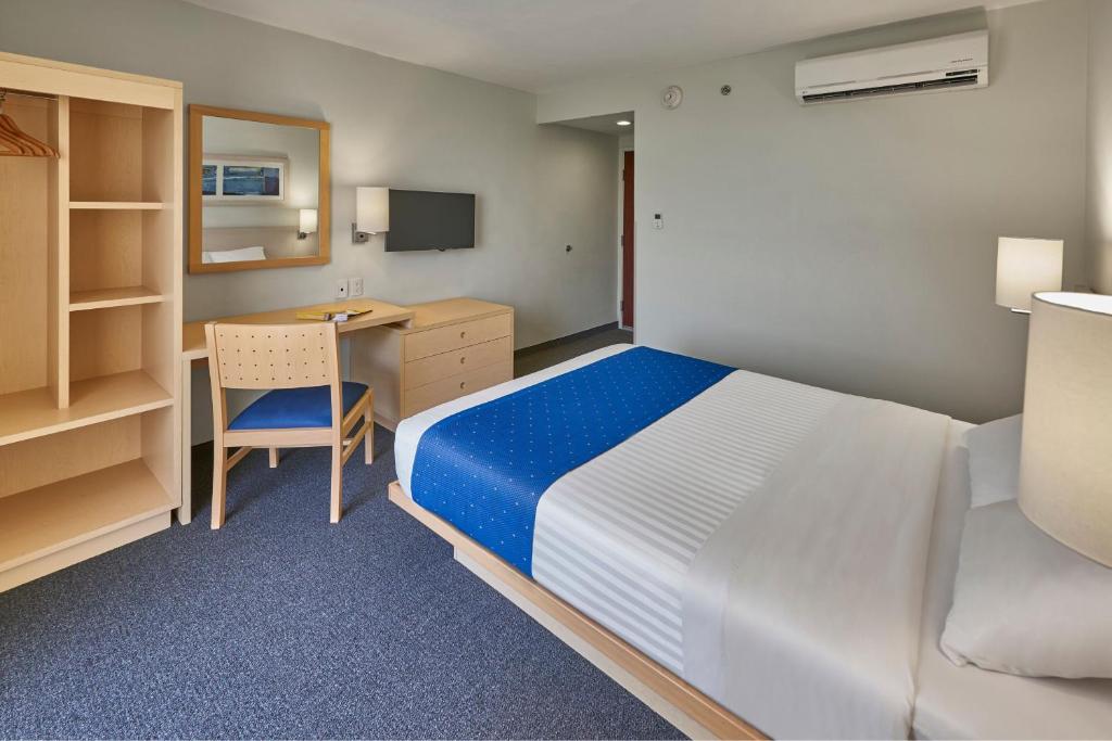 Cama o camas de una habitación en City Express by Marriott Puebla FINSA