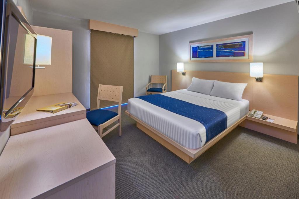 Cama o camas de una habitación en City Express by Marriott Puebla FINSA