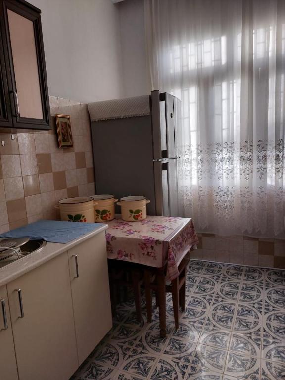 Kuchyň nebo kuchyňský kout v ubytování Camellia
