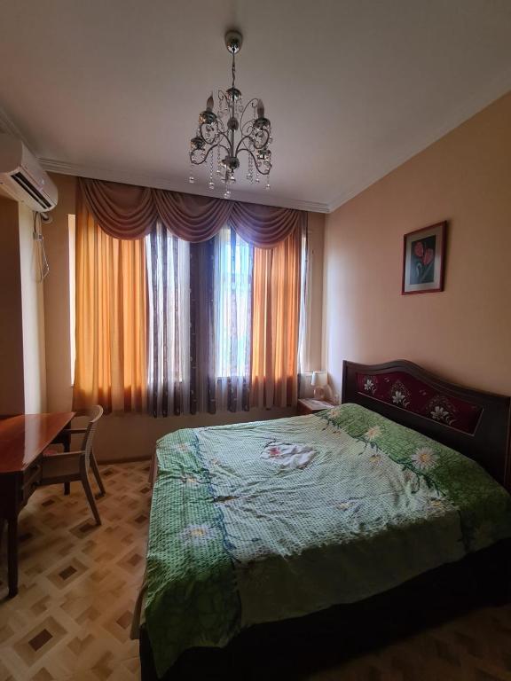 Postel nebo postele na pokoji v ubytování Camellia