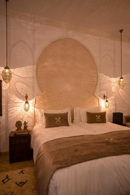Postel nebo postele na pokoji v ubytování Riad la clé d'or & spa