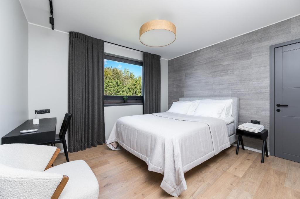 Postel nebo postele na pokoji v ubytování Serenity Villa