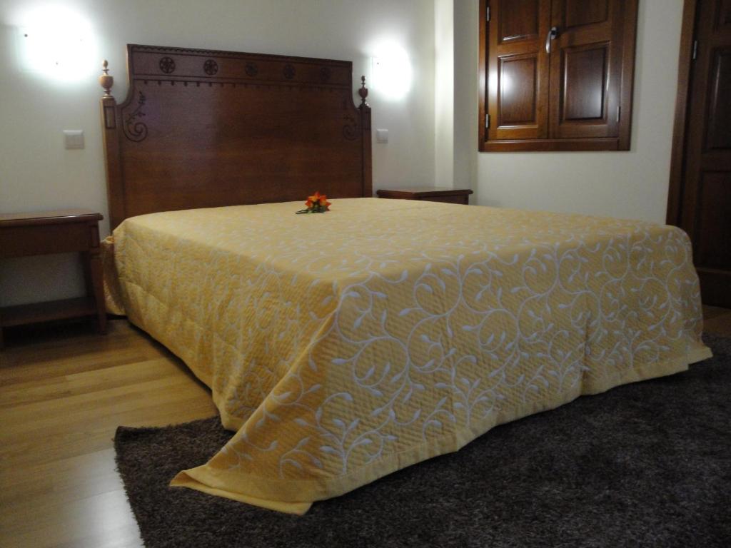 Postel nebo postele na pokoji v ubytování Guesthouse Muralhas do Mino