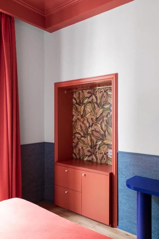 Postel nebo postele na pokoji v ubytování Hotel Montecarlo