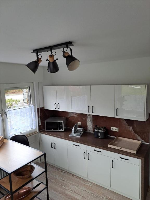 Kuchyň nebo kuchyňský kout v ubytování Gästehaus Senger