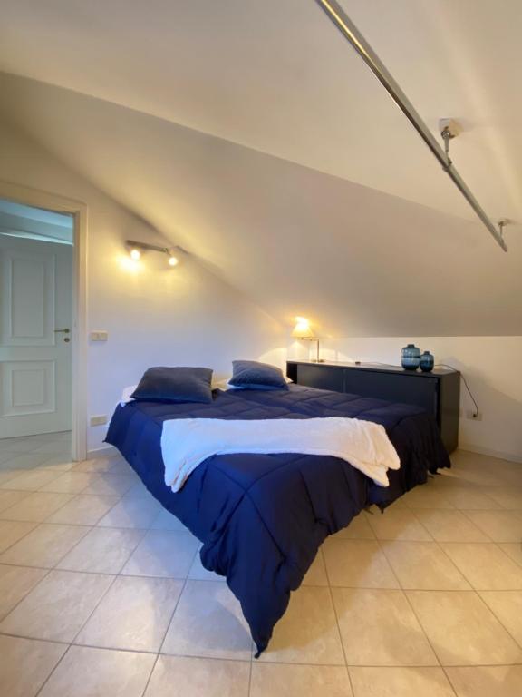 Giường trong phòng chung tại Veliero Fronte Mare Flexrent - Immobiliare Abissinia